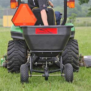 Pull behind spreader for lawn mower 2